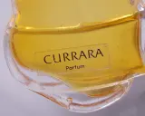 Szukasz perfumy Currara w Rossmannie? Cena może być zaskoczeniem! Złoty płyn w eleganckim flakonie.